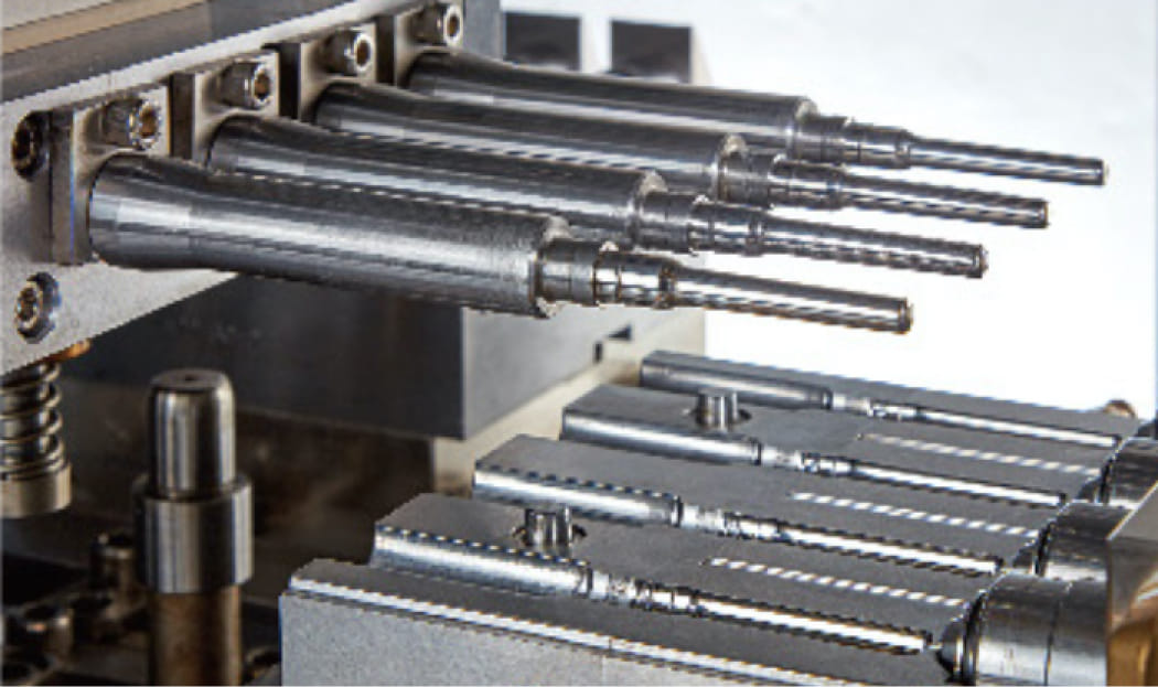 The material is injected into the preform cavities by injector and forming a parison with precise neck section. The material is injected into the preform cavities by injector and forming a parison with precise neck section.